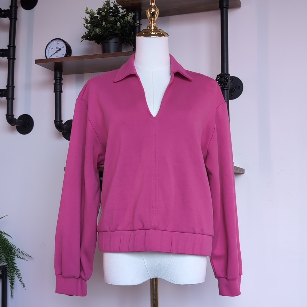 Luxe Target Black History Month Collared Pullover in Bright Pink. Perfect for Co